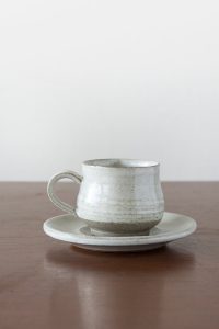 White Pottery Espresso Cup and Matching Saucer