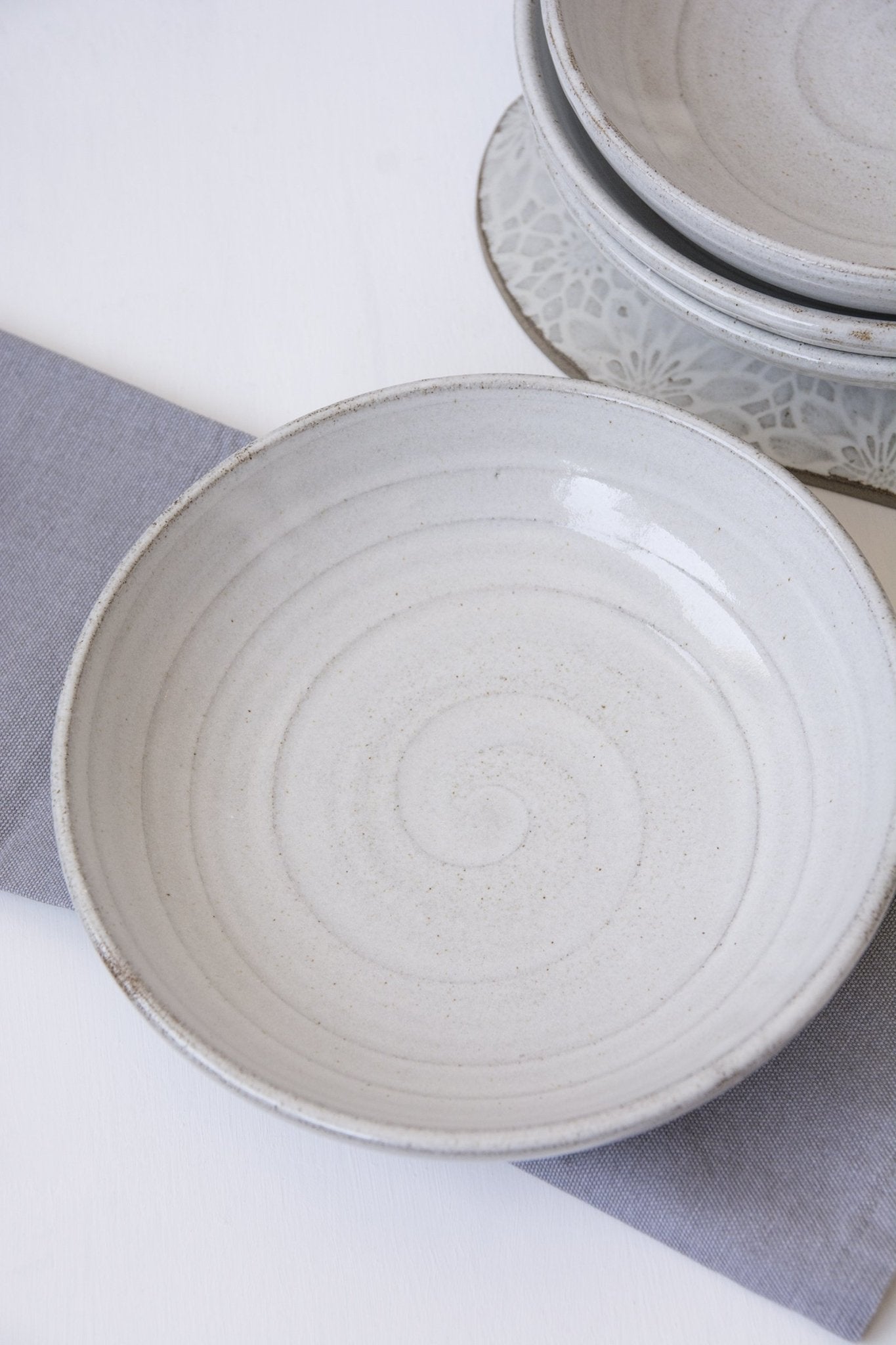 Set of Four White Pottery Pasta Bowls